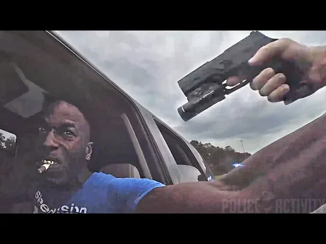 bodycam shows deputy hanging onto suv before shooting driver